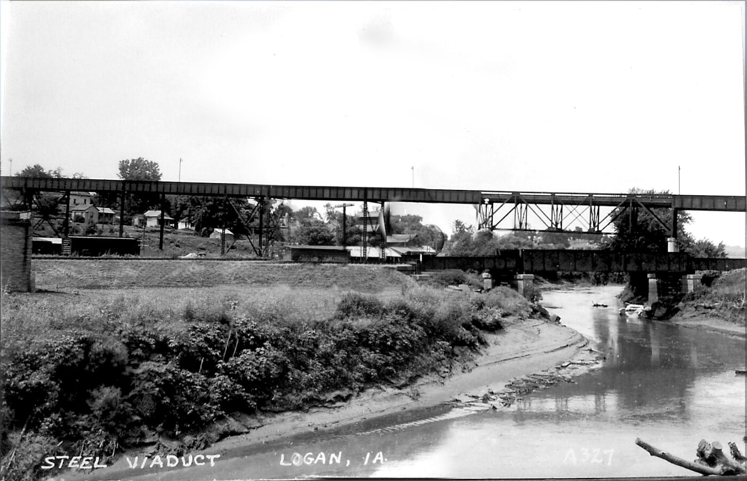 Historic postcard of bridge, showing bridge prior to 1950s reconstruction.  Note old Lincoln Highway viaduct in background